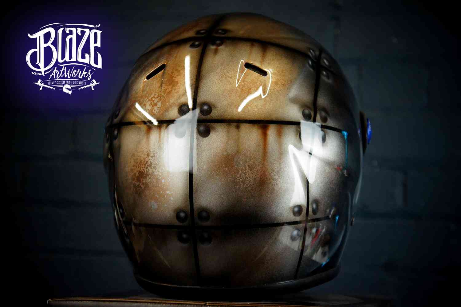 Brown weathered anatomical skull design painted on motorcycle helmet with bone texture and realistic shading effects